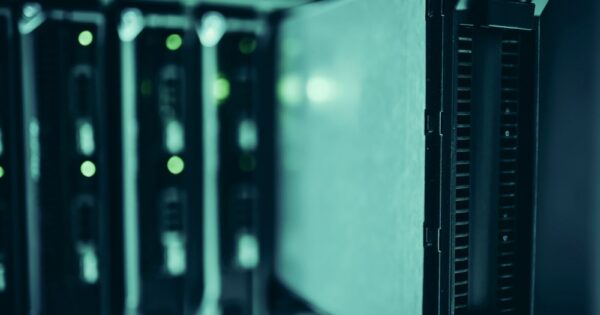 Close-up of server racks in a data center highlighting modern technology infrastructure.