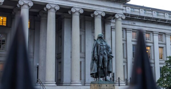 Statue of Albert Gallatin in front of the US Treasury Department building in Washington, DC.