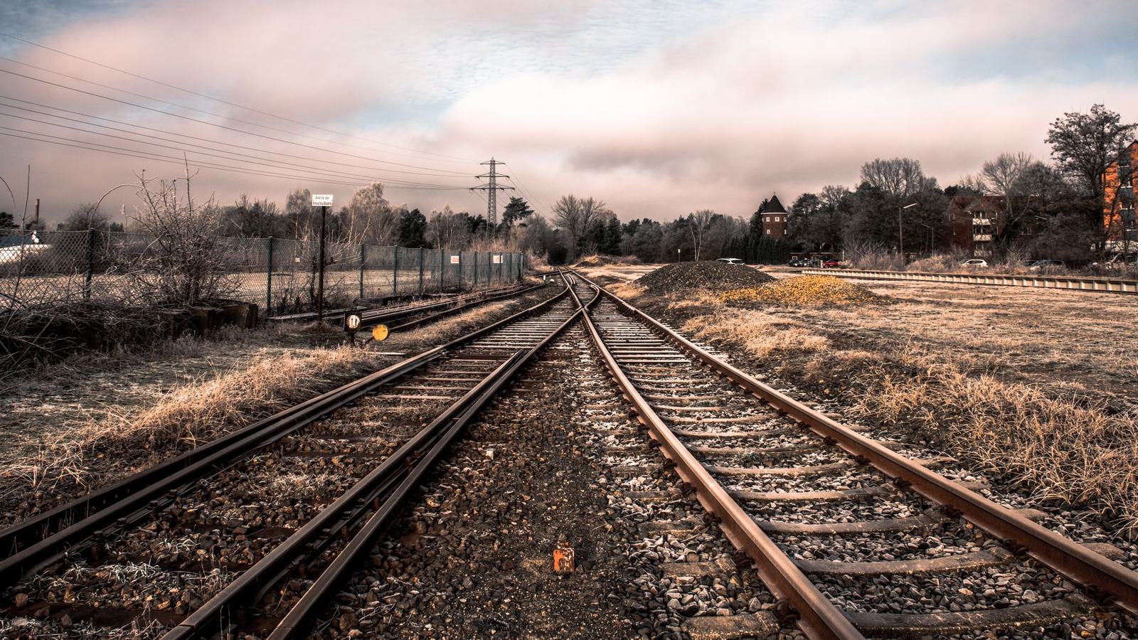 A frosty morning scene of railway tracks in Germany, perfect for travel photography.