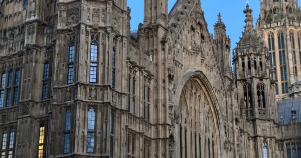 Close-up view of the intricate Gothic architecture of Westminster Palace in London.
