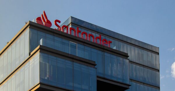 Exterior view of the modern Santander building in Puebla, Mexico, under a clear blue sky.