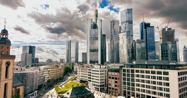 A stunning aerial view of Frankfurt's skyscrapers under dramatic skies. Perfect for business and travel enthusiasts.